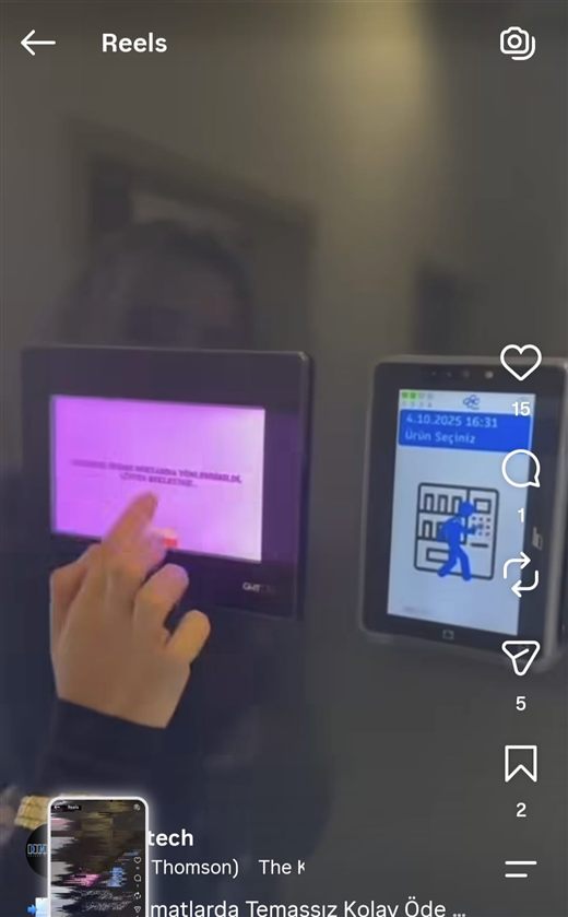 The same machine close up — its own HMI panel and our device side by side, connected over Modbus