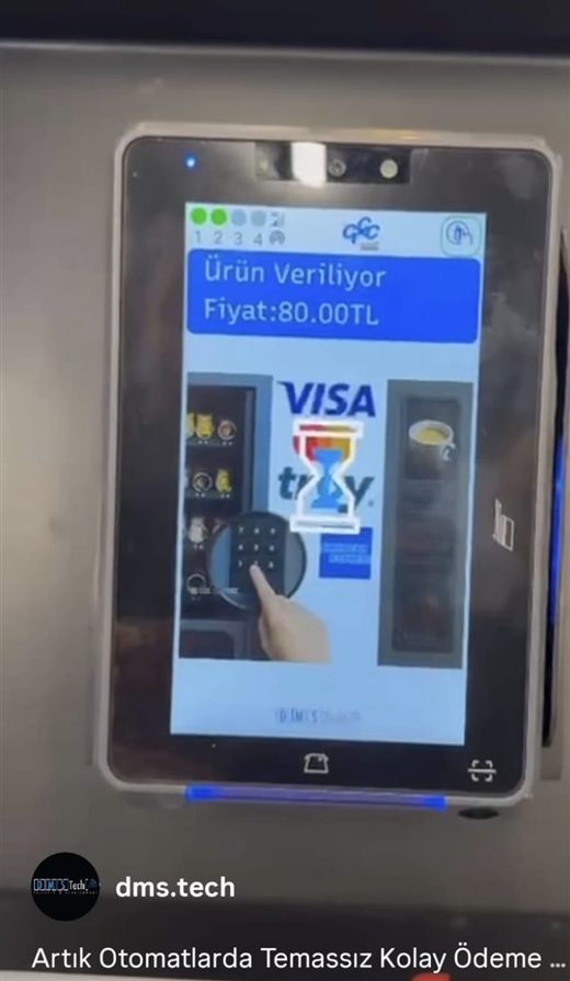 A coffee machine at Opet's Ultracafé outlets, with Nestlé Professional: the payment device is ours, and its screen carries our name — in a public retail forecourt, not a workplace